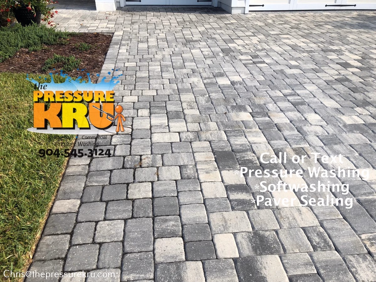 Paver driveway cleaning in Silverleaf Village before pressure washing.