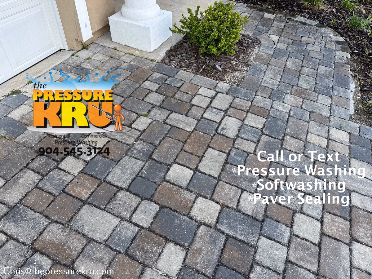 Clean restored paver driveway before professional pressure washing in Fruit Cove, FL.