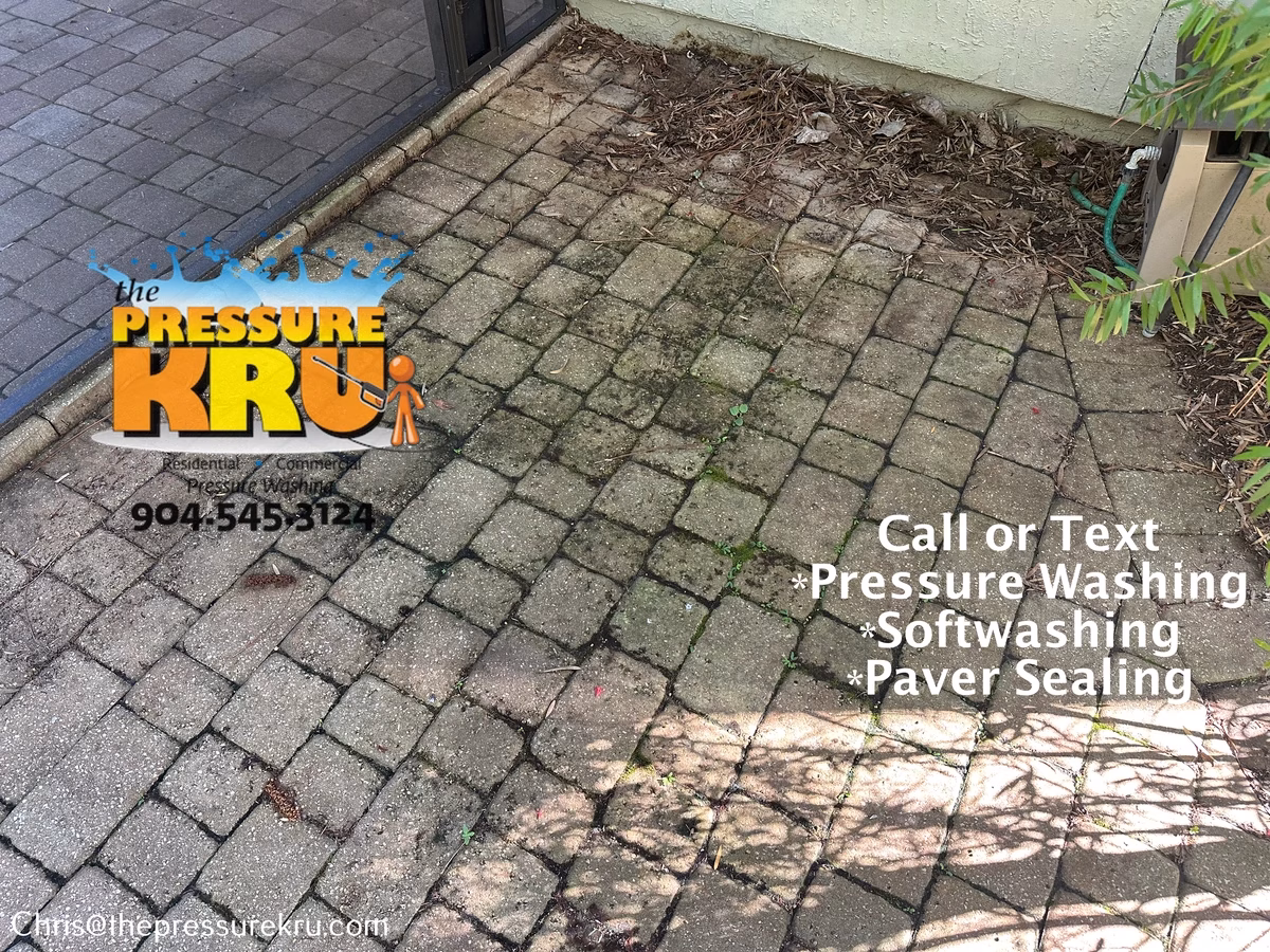Patio pressure washing improves the appearance of pavers in St. Johns Forest before