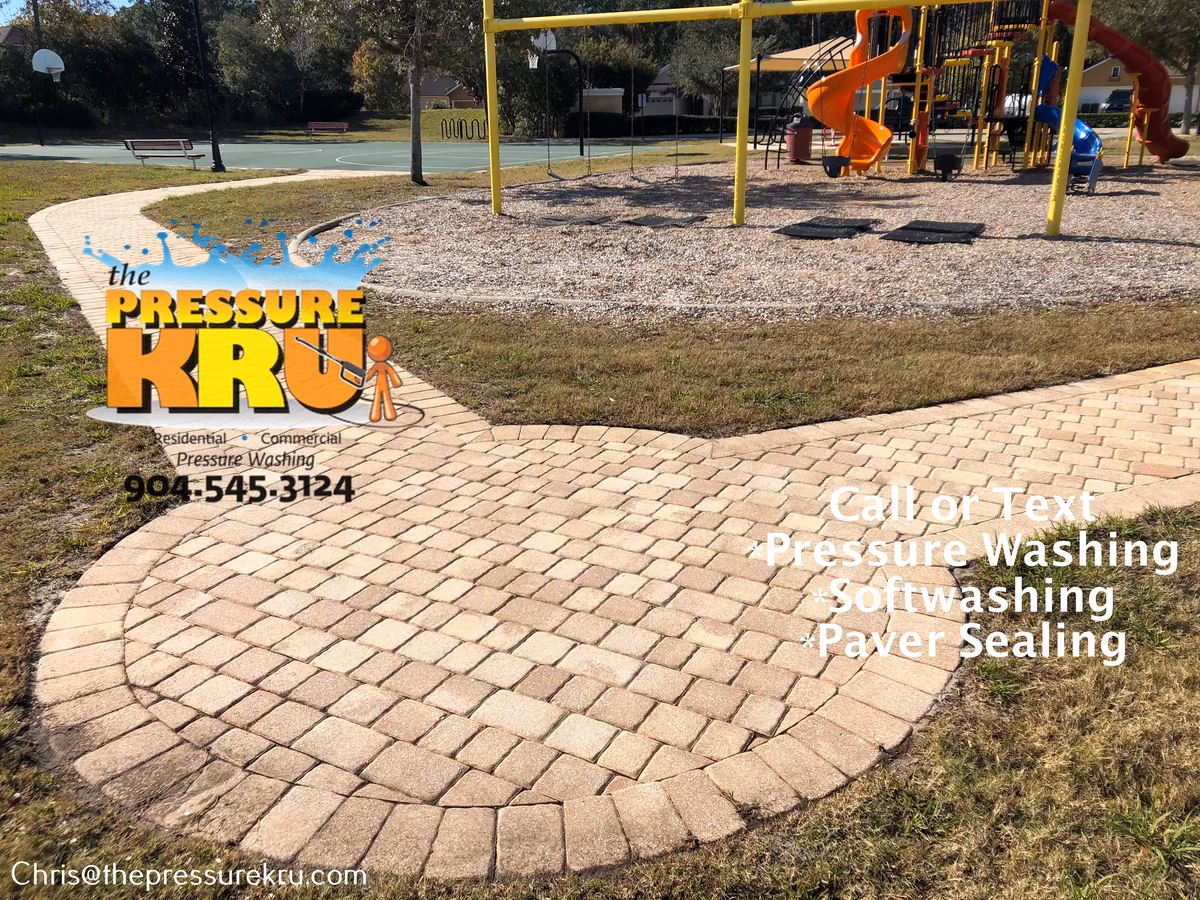 Paver patio surface cleaned by pressure washing in Sawgrass after