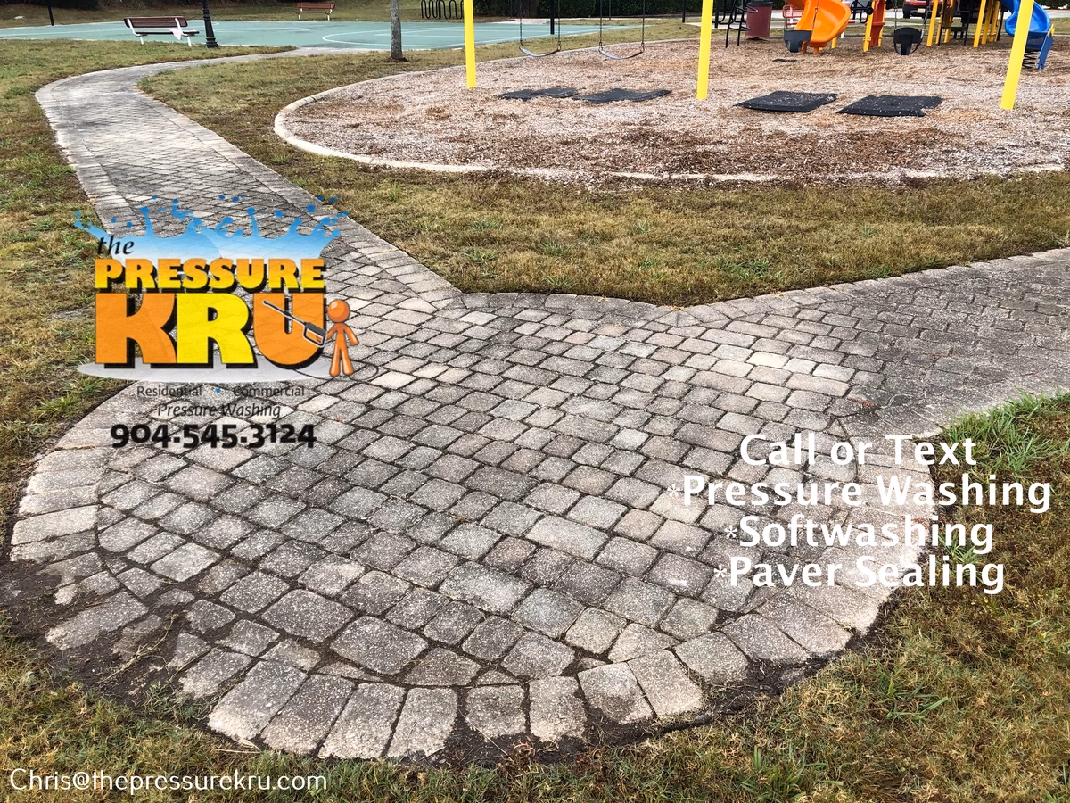 Paver patio surface cleaned by pressure washing in Sawgrass before