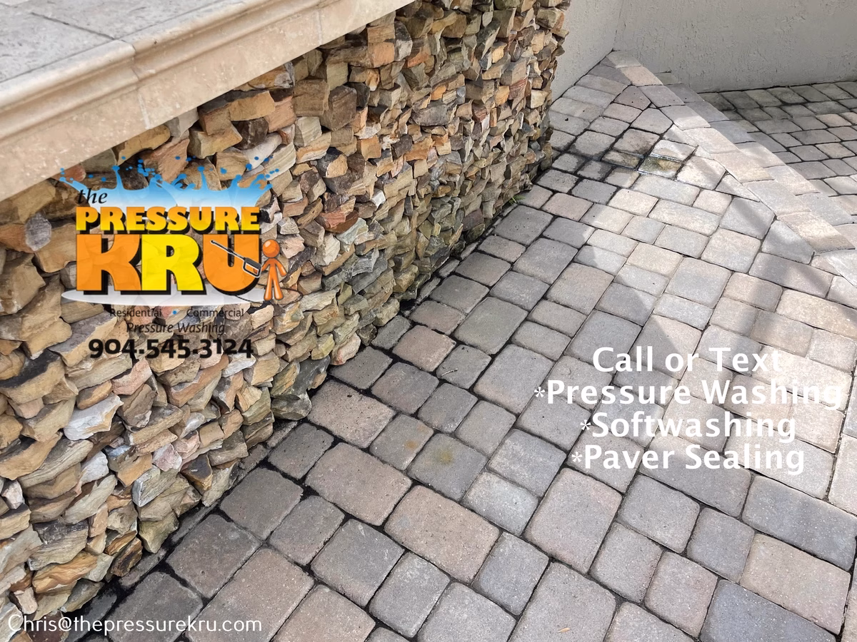 Residential paver patio pressure washing in St. Johns, FL before.