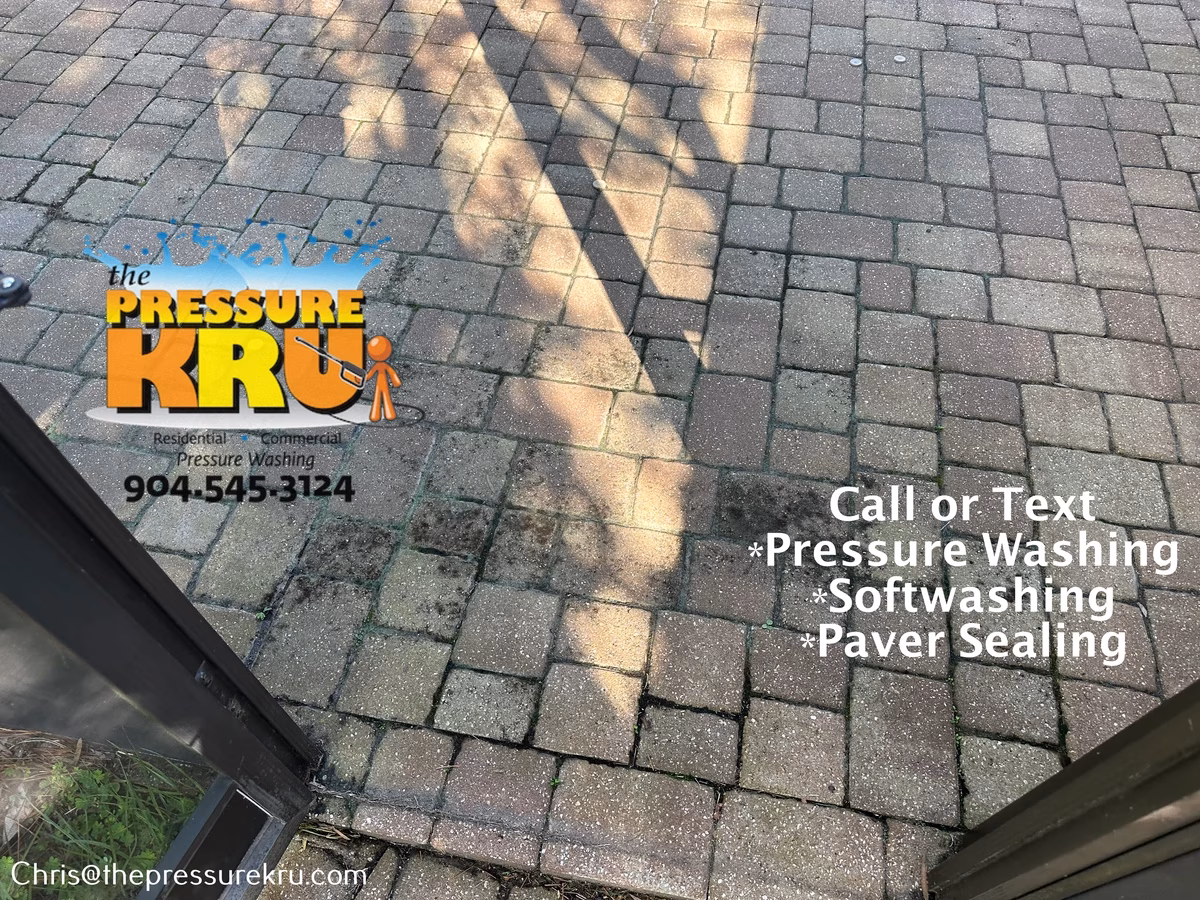 Professional paver cleaning for outdoor living space in Heritage Landing before.