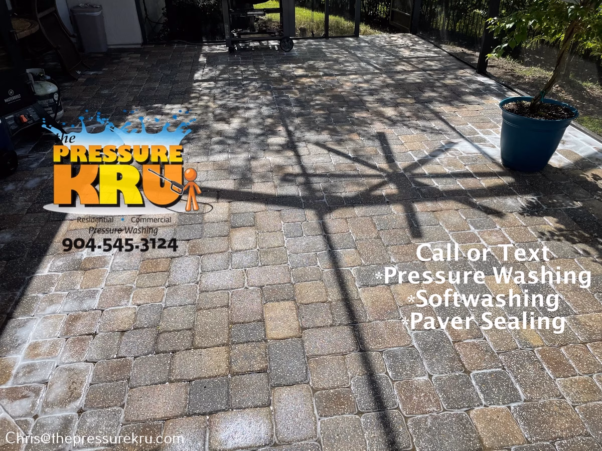 Pressure washing back yard paver patio in St. Johns, FL after.
