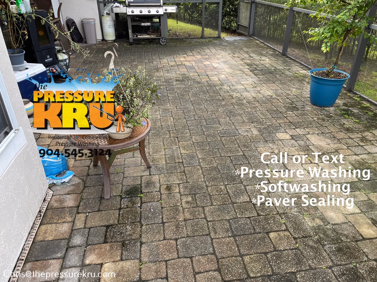 Pressure washing back yard paver patio in St. Johns, FL before.