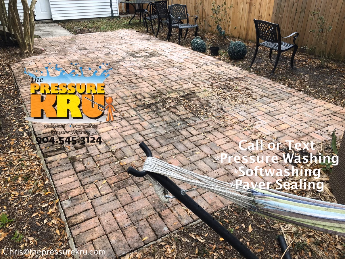 Deep cleaning a paver patio covered by trees in South Hampton before