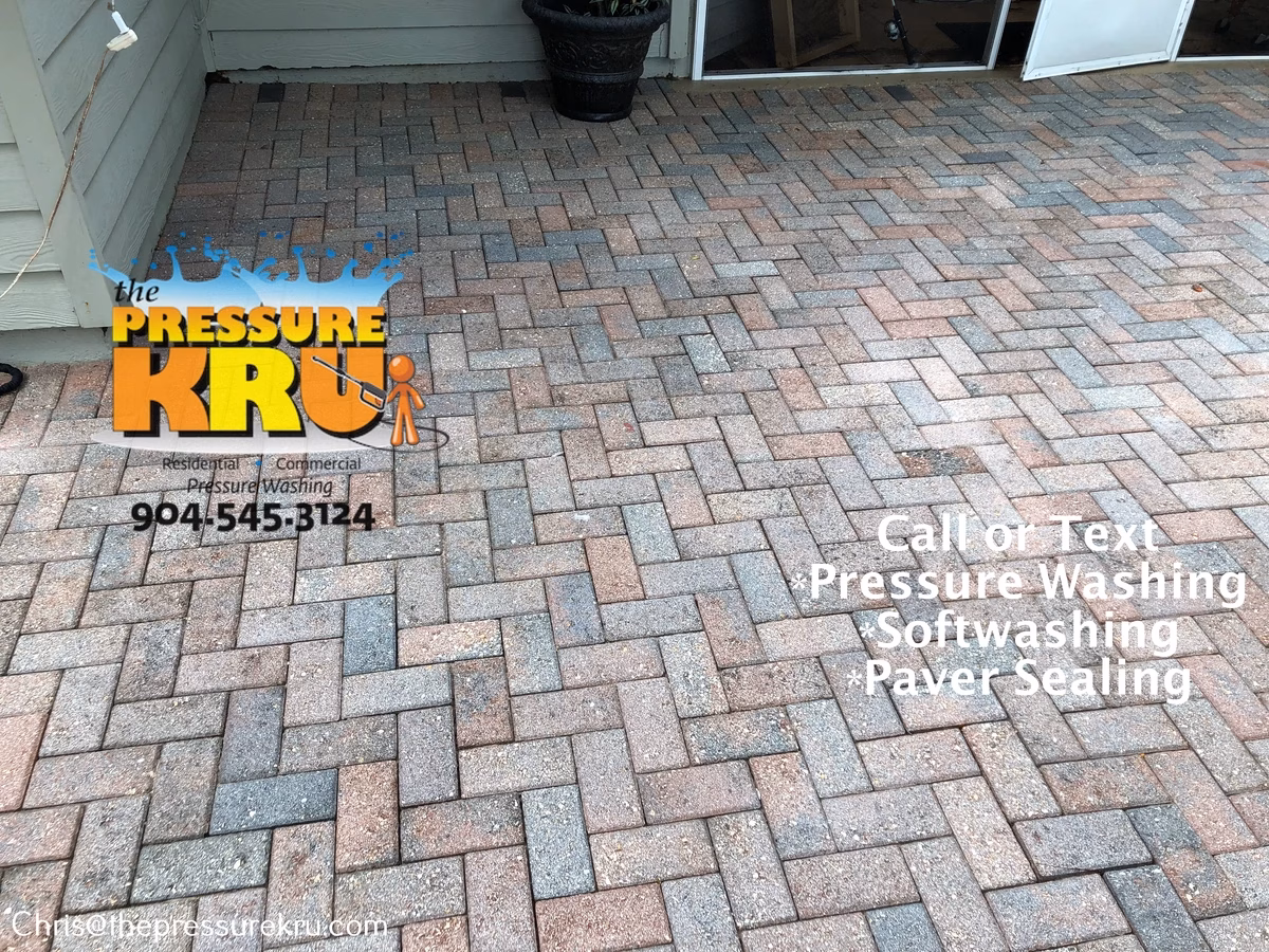 Pressure washing stained patio in Murabella after