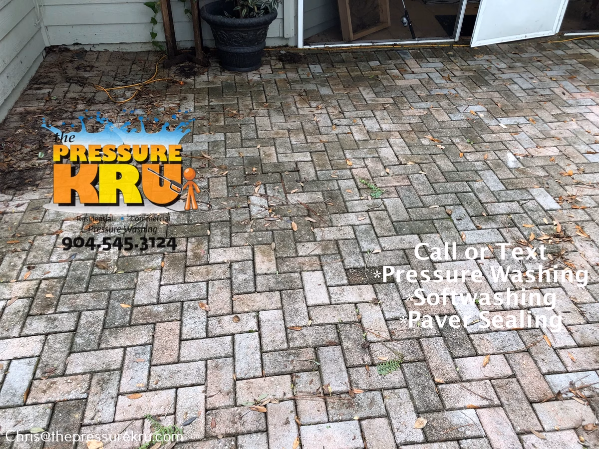 Pressure washing stained patio in Murabella before