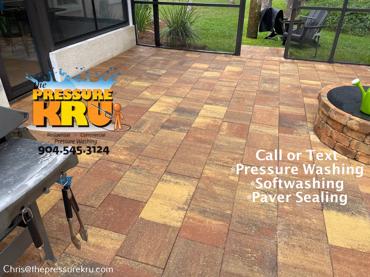 Paver patio pressure washing before soft washing in Marsh Landing after.