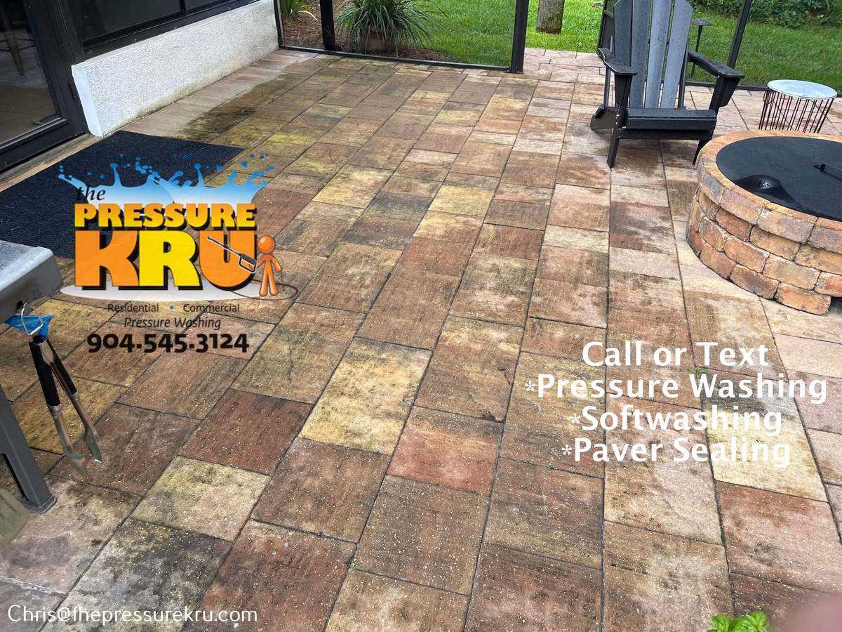Paver patio pressure washing before soft washing in Marsh Landing before.