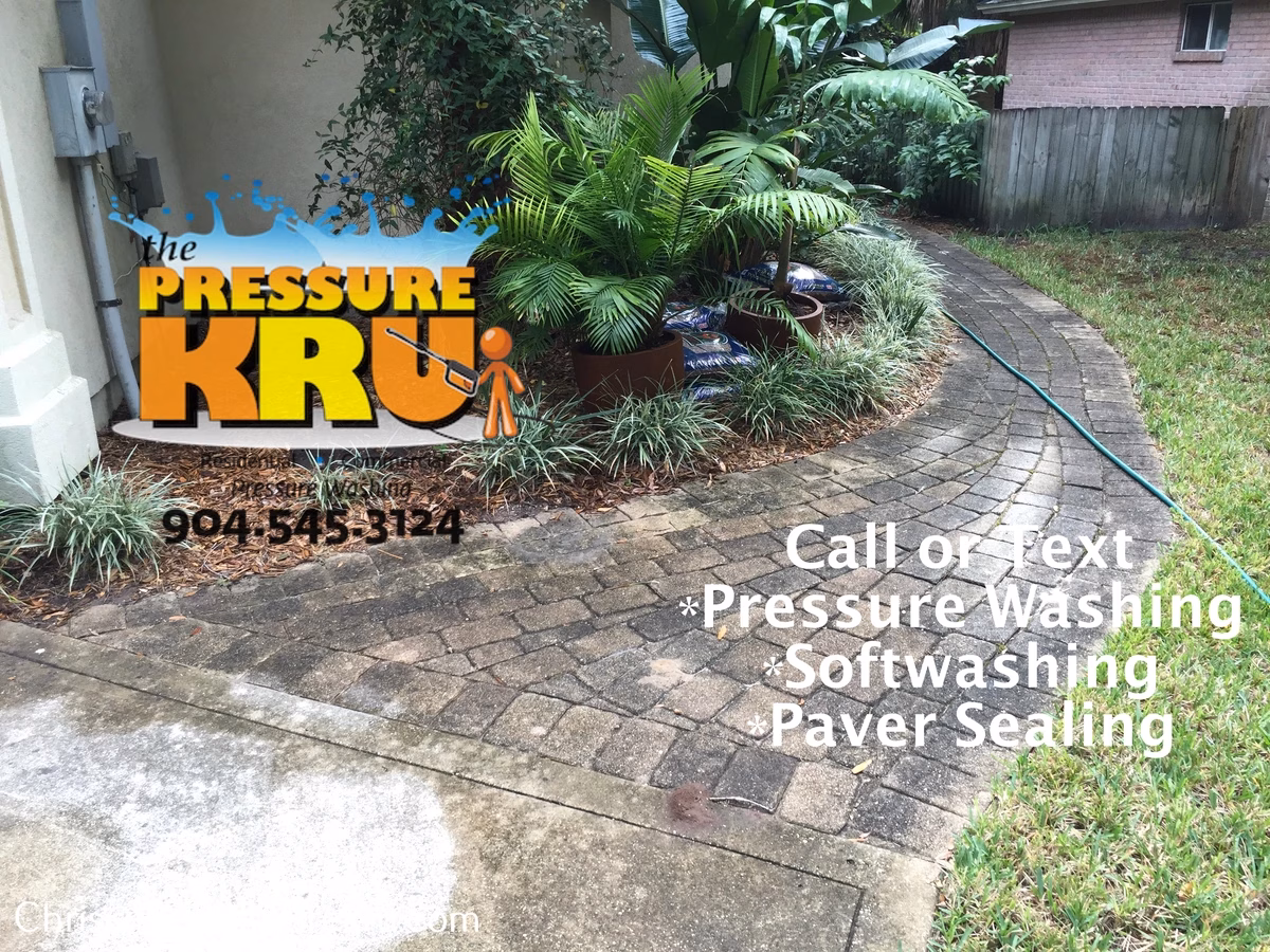 Professional paver driveway and sidewalk maintenance before in Nocatee, FL.