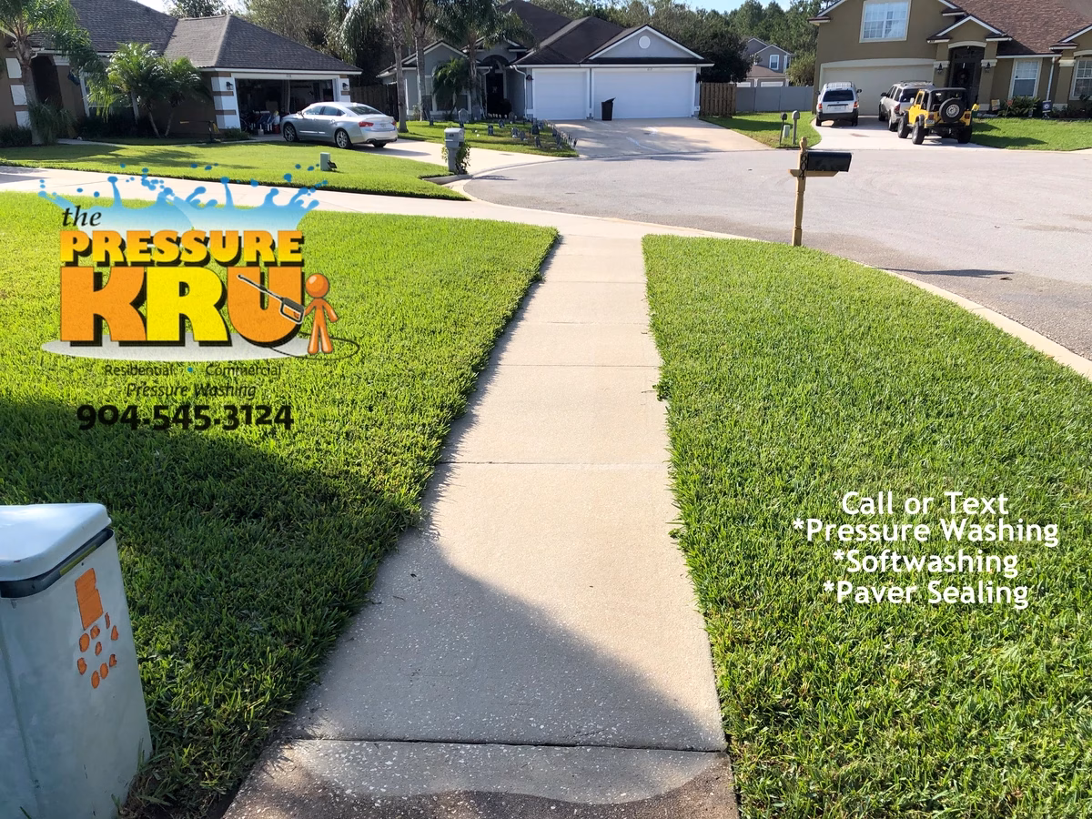 Residential driveway after cleaning by The Pressure Kru in St. Johns, FL.