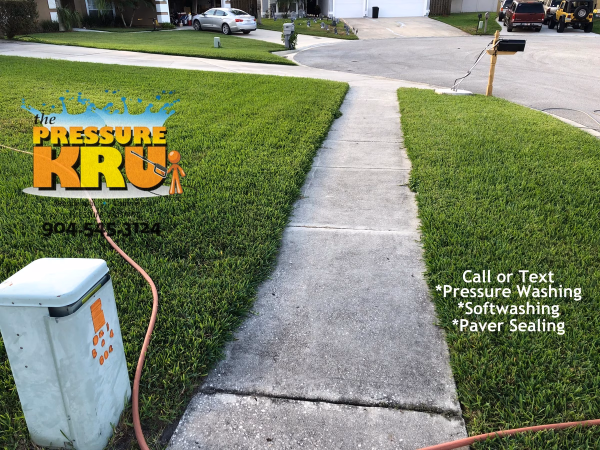 Residential driveway before cleaning by The Pressure Kru in St. Johns, FL.