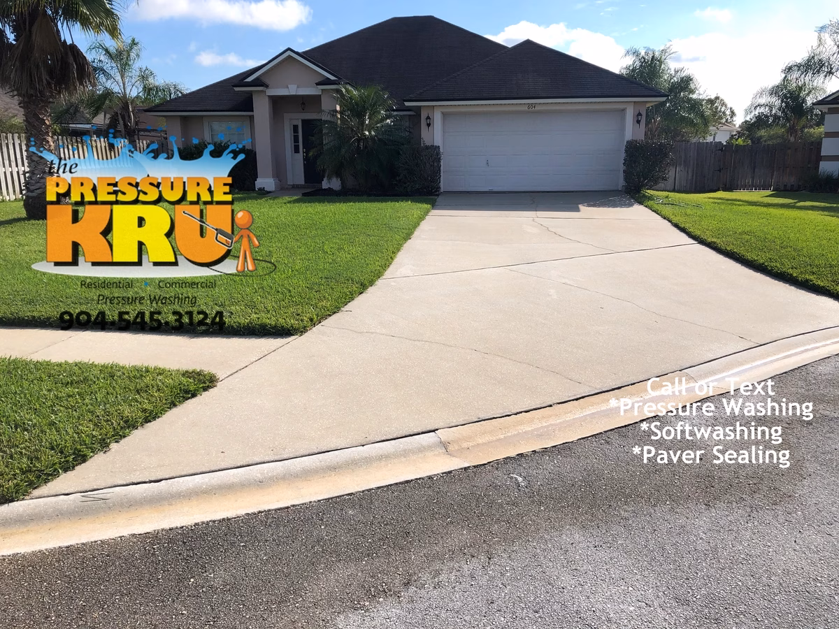 Driveway cleaning after removing mold and algae buildup in St. Johns, FL.