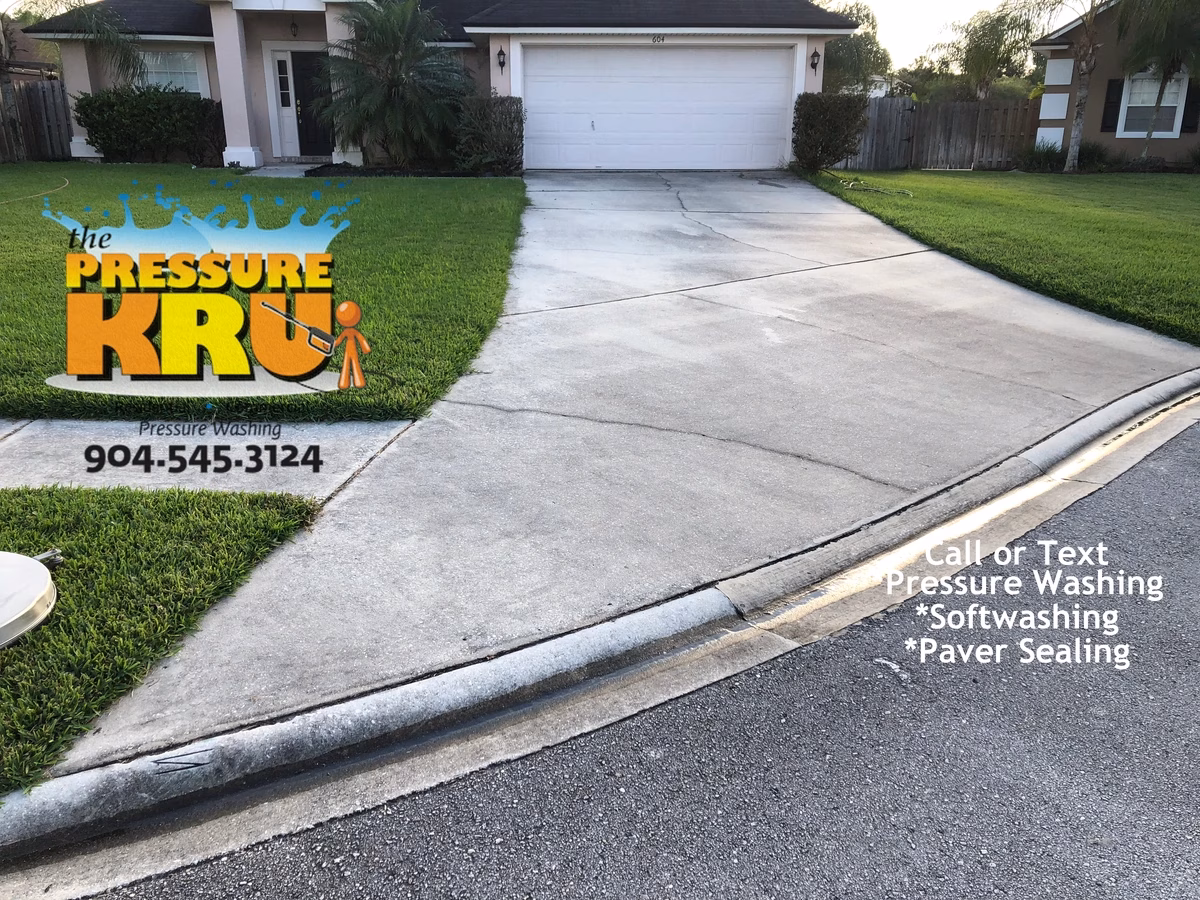 Driveway cleaning before removing mold and algae buildup in St. Johns, FL.