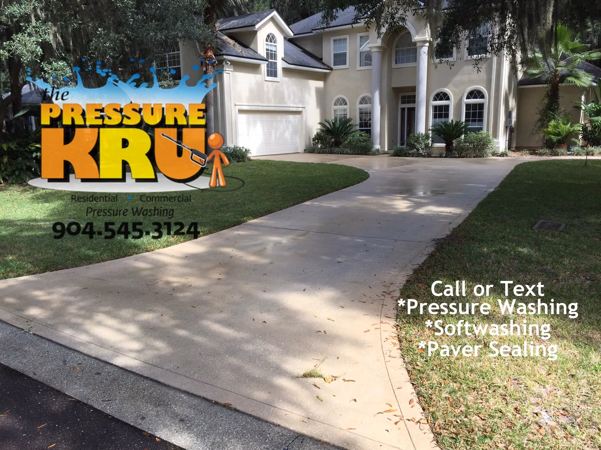 Clean concrete driveway after exterior pressure washing service in St. Johns, FL.