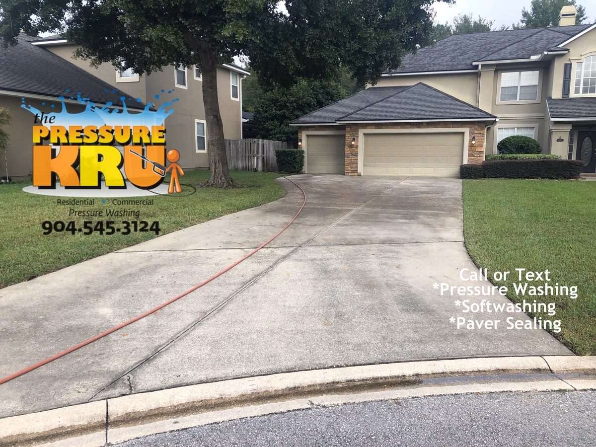 Professional driveway cleaning before removing dirt and mildew in St. Johns, FL.
