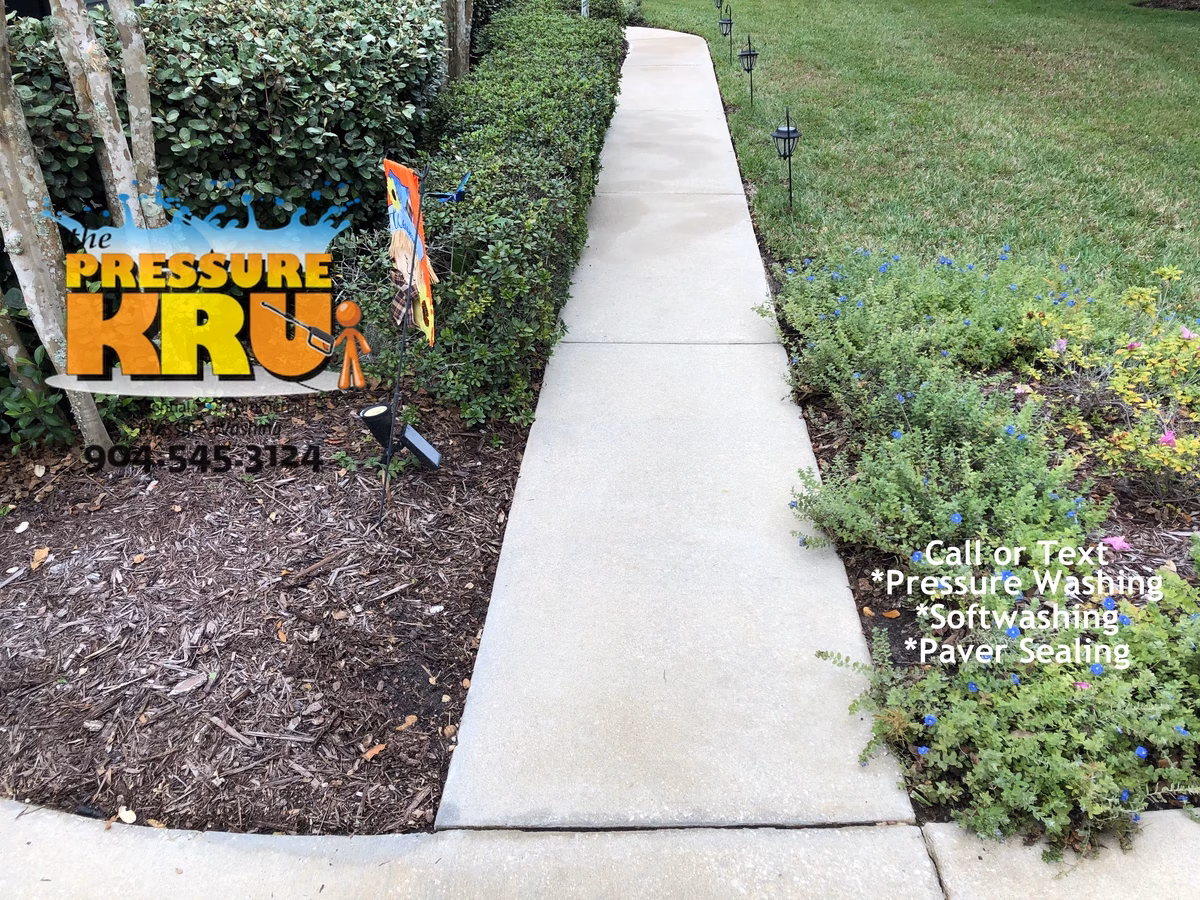 Professional driveway after exterior pressure washing service in St. Johns, FL.