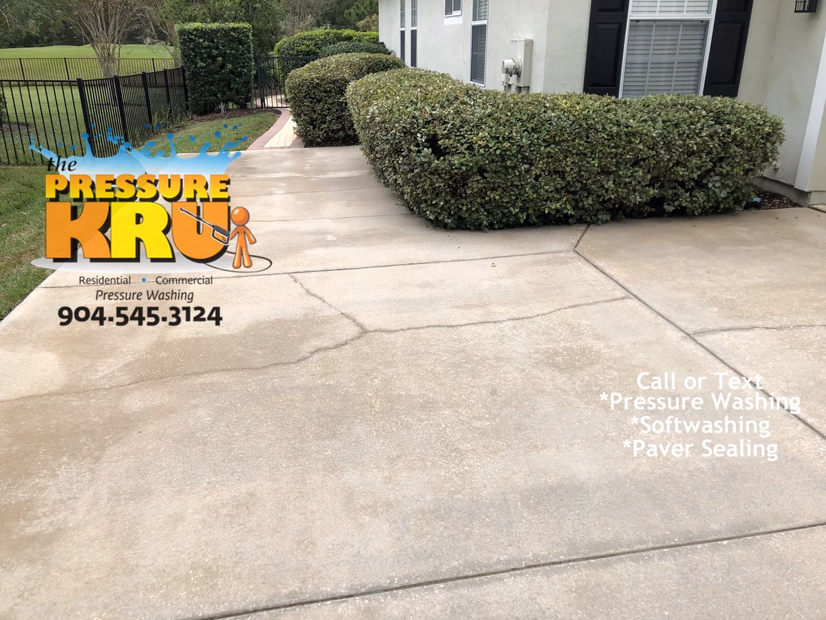 Concrete driveway free of algae after pressure washing service in St. Johns, FL.