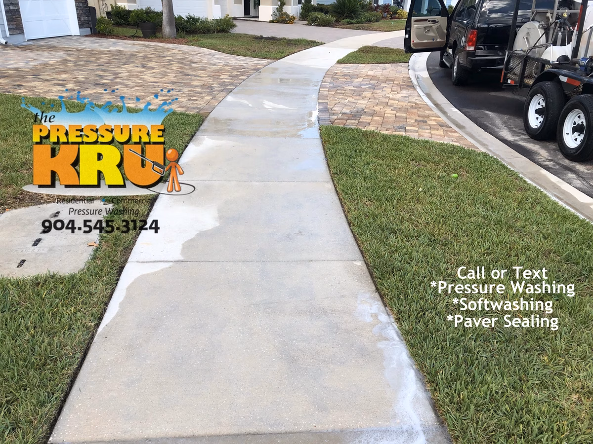 Driveway pressure washing in St. Johns, FL after removing years of black algae.