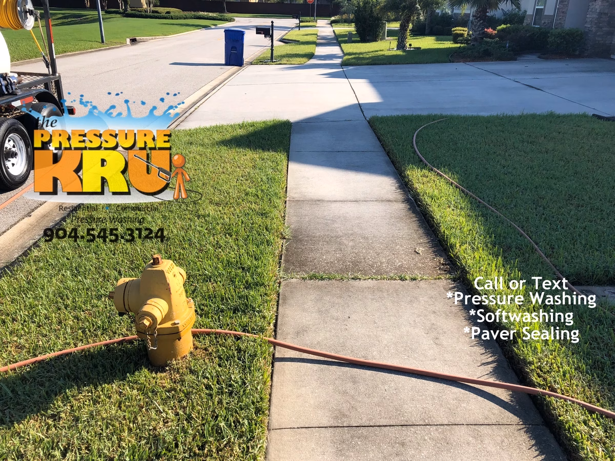 Driveway power washing in Jacksonville, FL. before mobilization.