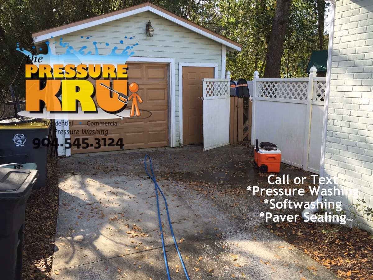 Driveway pressure washing in Jacksonville, FL before chemical post treatment.