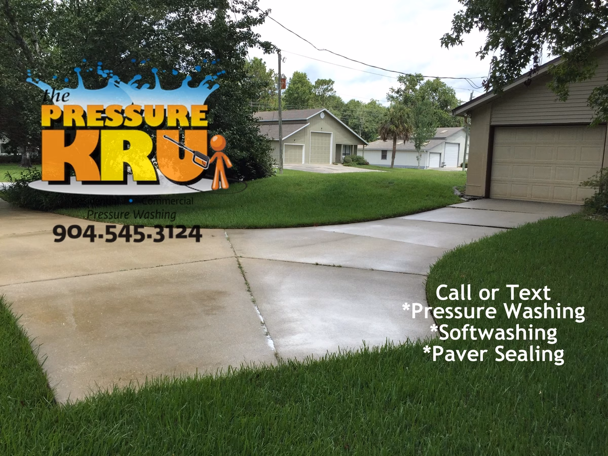Driveway pressure cleaning in St. Augustine, FL after removing mold and dirt.