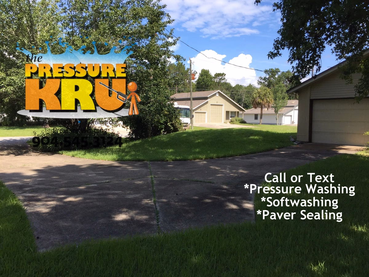 Driveway pressure cleaning in St. Augustine, FL before removing mold and dirt.