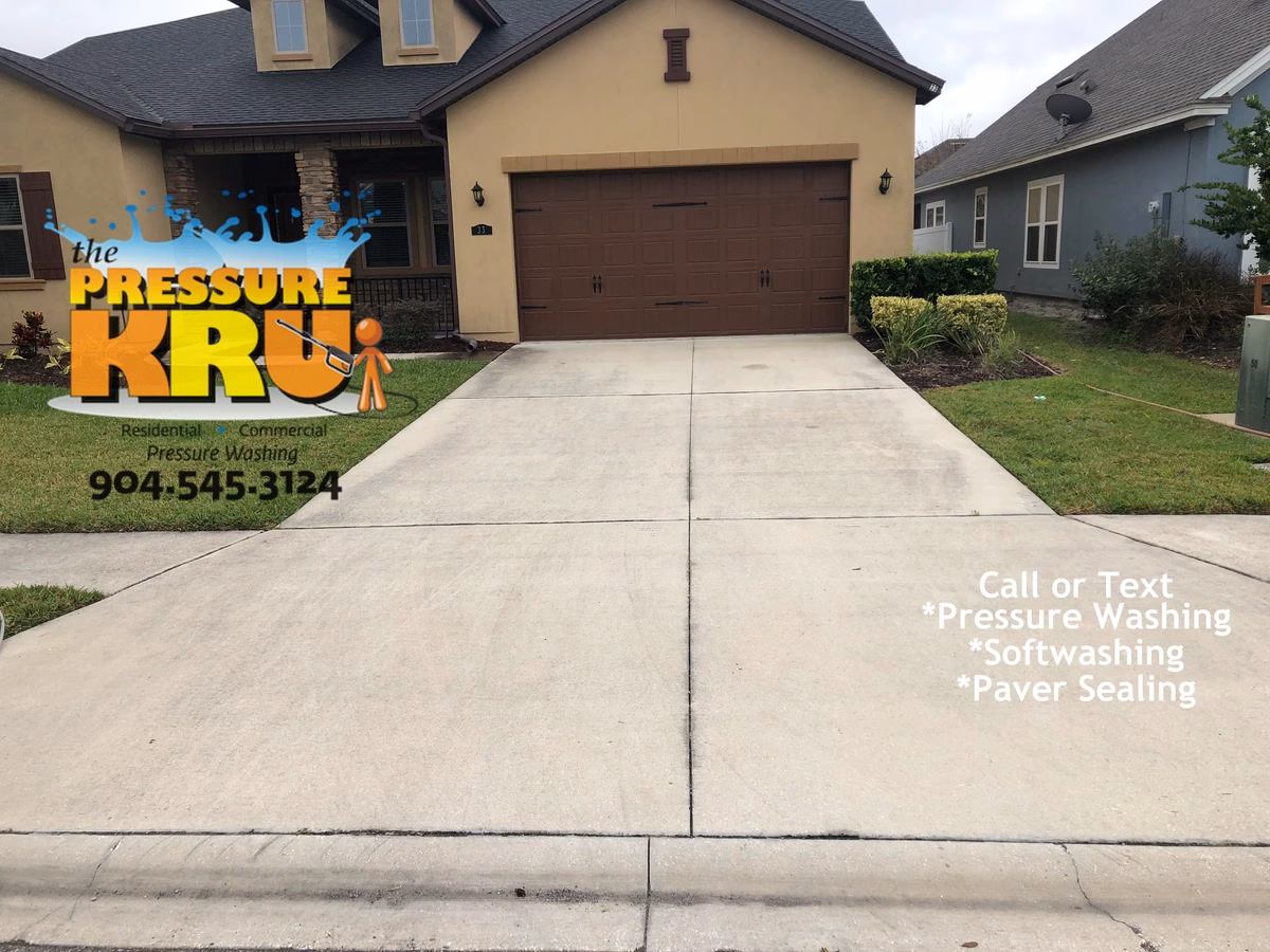 Driveway pressure washing service in St. Johns, FL. before removing mold from surfaces.