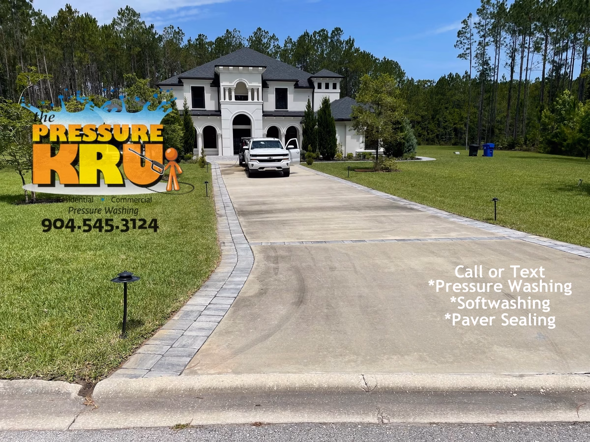 Driveway cleaning in Greenbriar Plantation luxury home before professional washing.