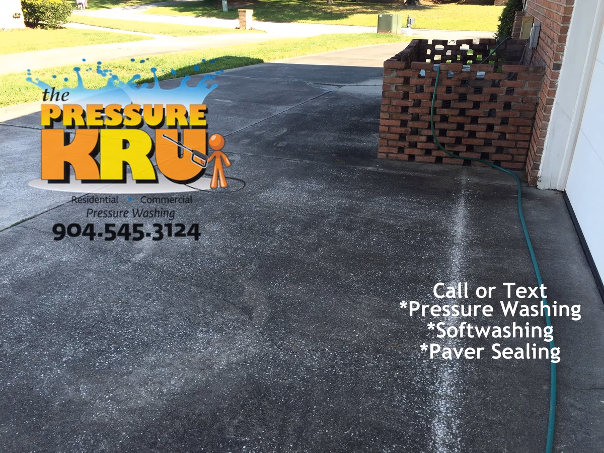 Driveway pressure washing service in St. Johns, FL before removing years of grime.