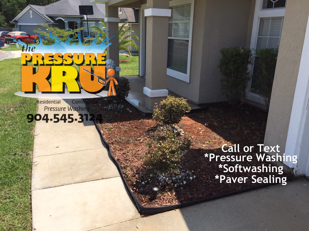Concrete sidewalk professional cleaning in St. Augustine, FL after post softwash chemical treatment.