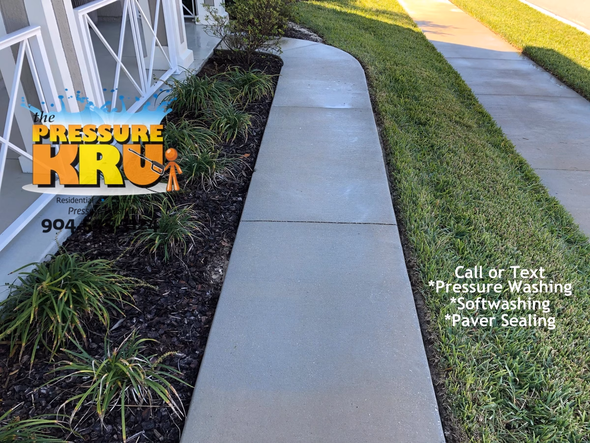 Sidewalk pressure cleaning in Fruit Cove, FL after softwashing. Undeniable a professional was on site.