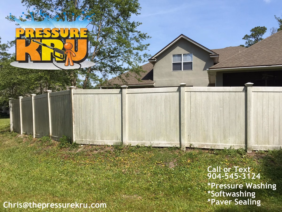 Vinyl Fence cleaning in Worthington Park before algae removal. Was able to clean both sides of this fence.