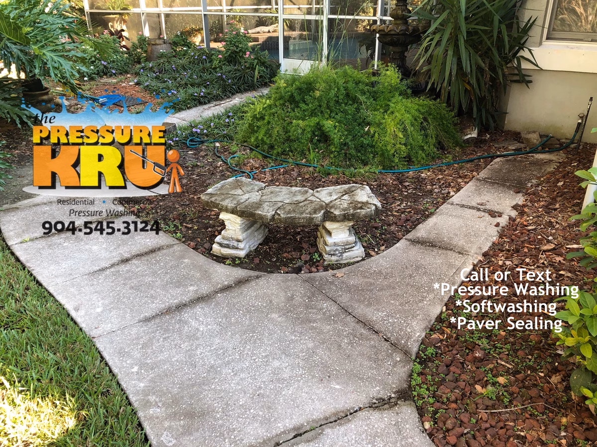 Sidewalk pressure washing in St. Augustine, FL before cleaning
