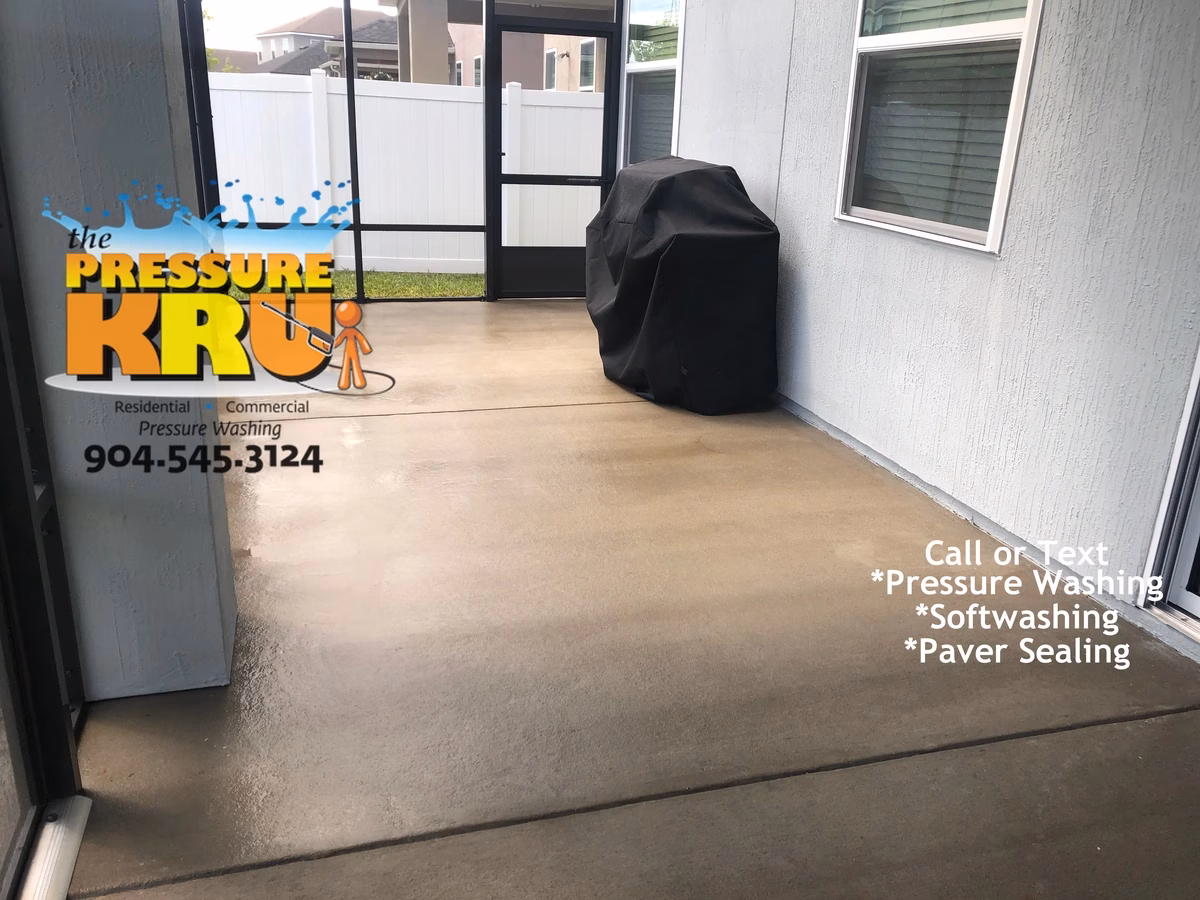 concrete patio pressure washing in Jacksonville, Florida after cleaning.