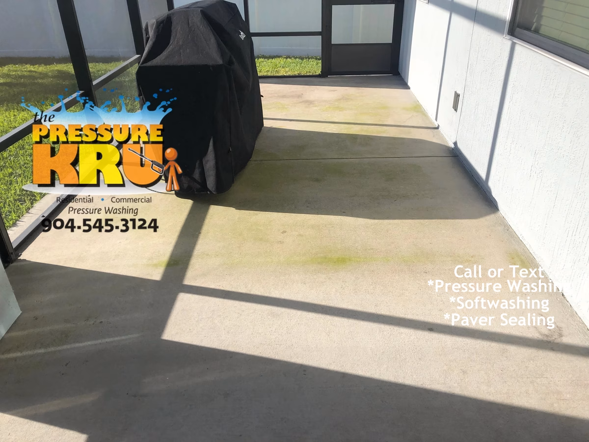 concrete patio pressure washing in Jacksonville, Florida before cleaning.