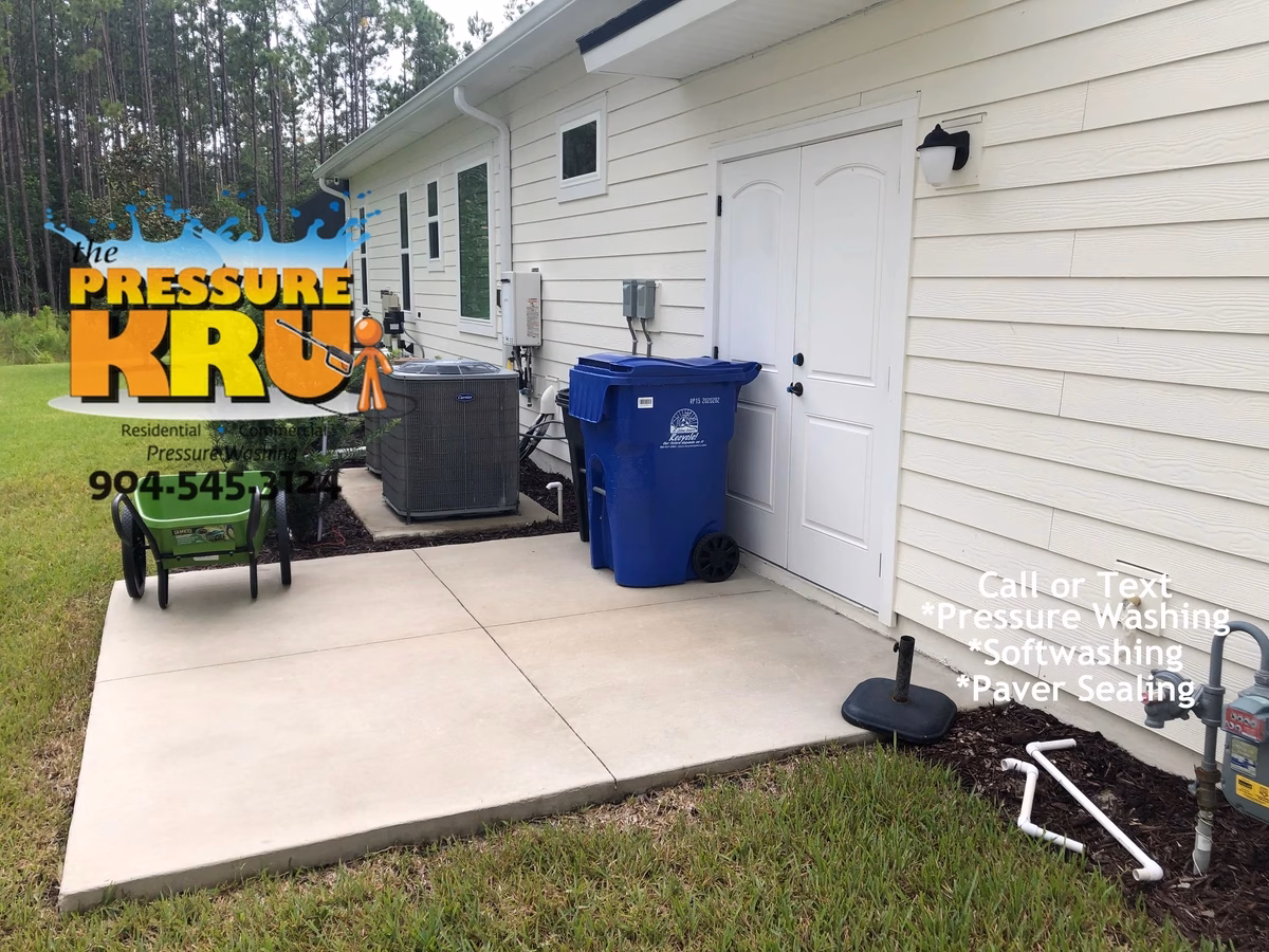 Concrete patio cleaning in St Johns FL after. Home owner combined with house wash and I threw in a bonus A/C condenser pad cleaning.