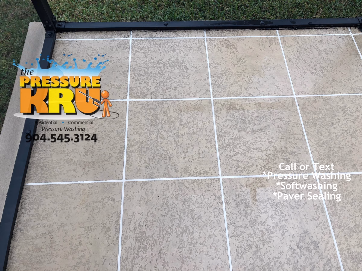 Pressure wash organic stained painted patio floor World Golf Village after