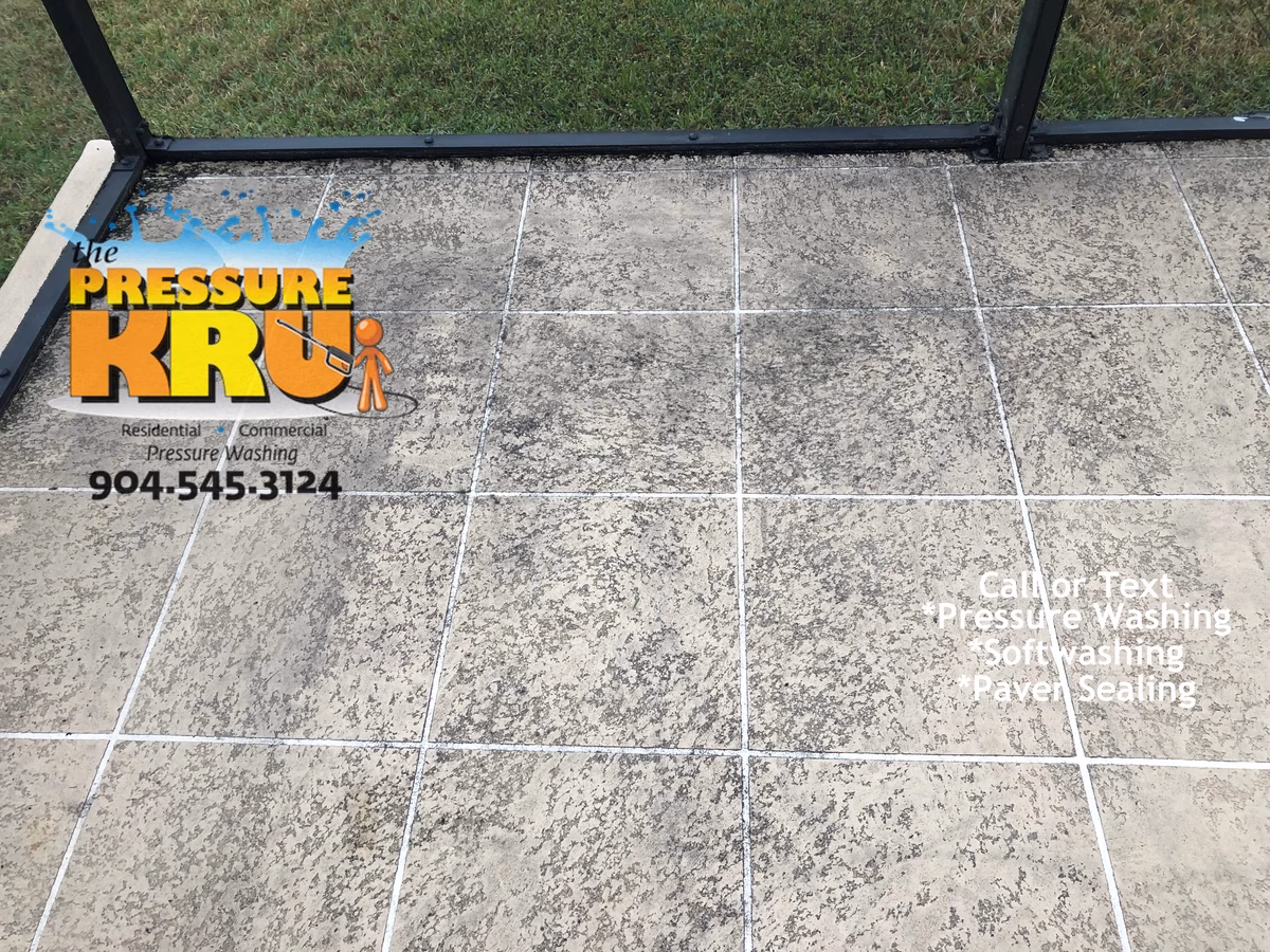 Pressure wash organic stained painted patio floor World Golf Village before