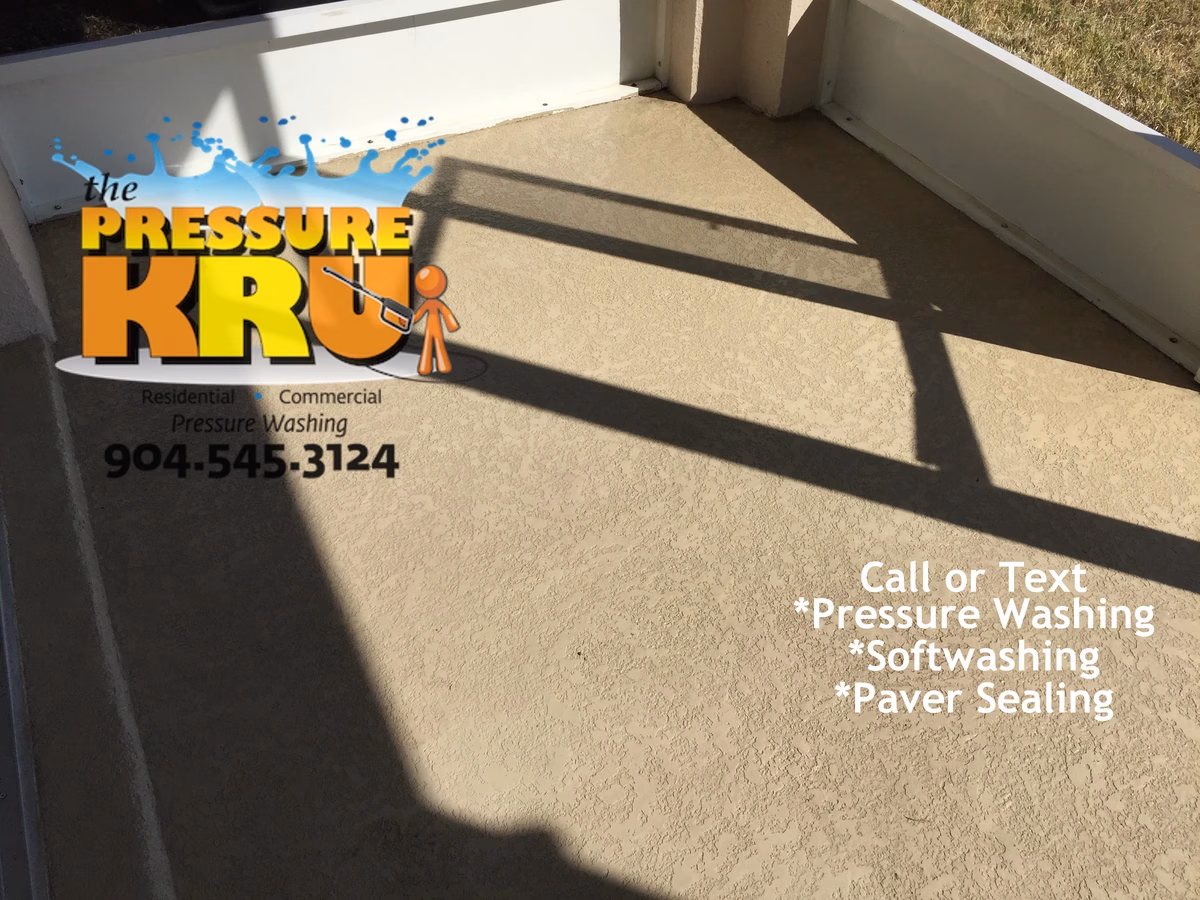 Soft pressure washing painted rear patio floor in Celestina after