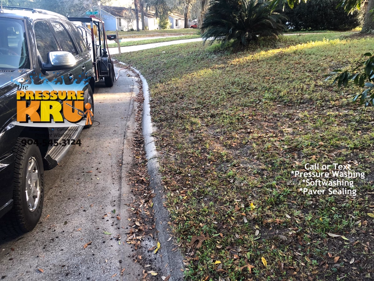 Driveway curb cleaning in St. Johns, FL before
