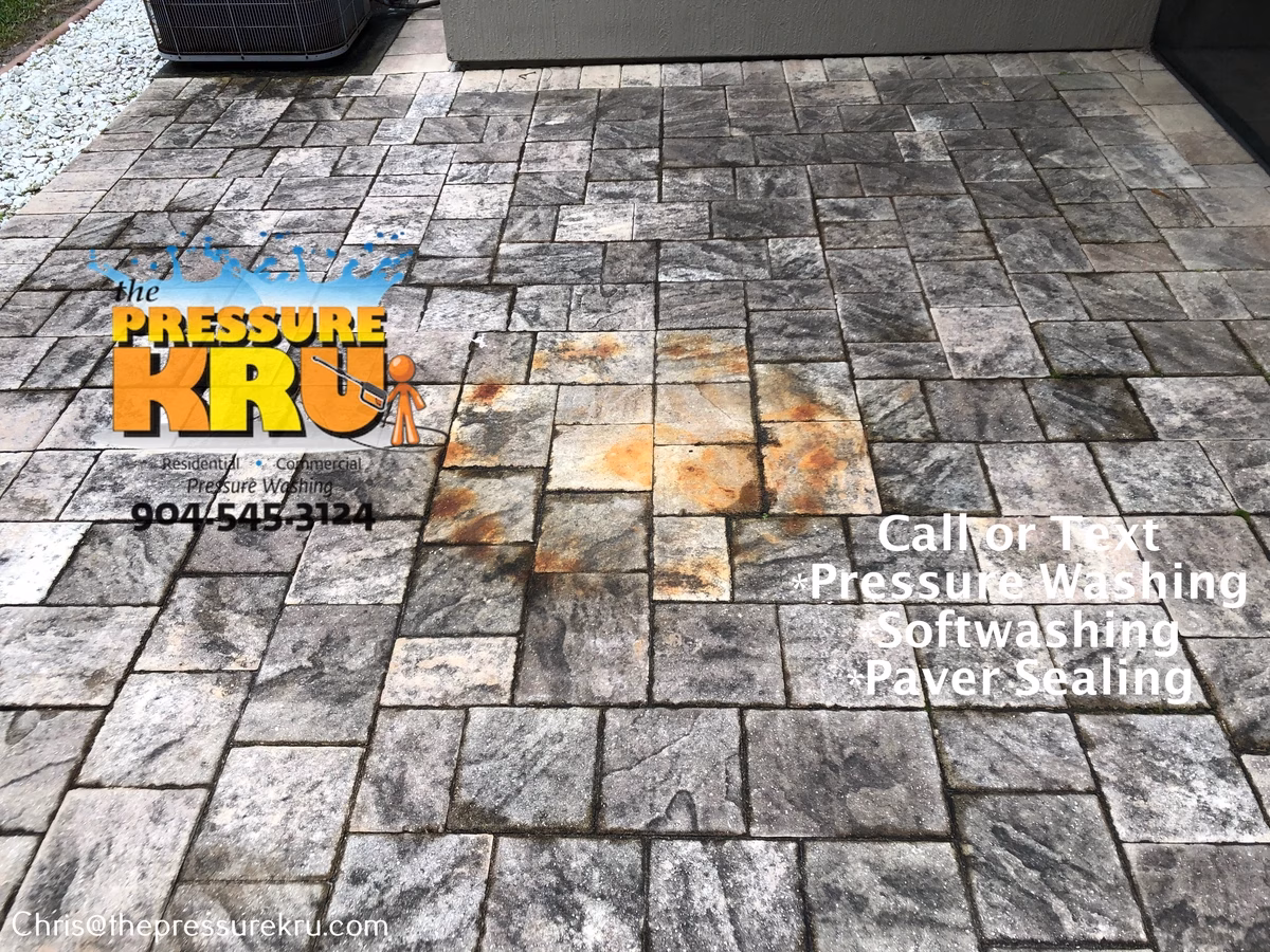 Restored paver patio before pressure washing in Stillwater.