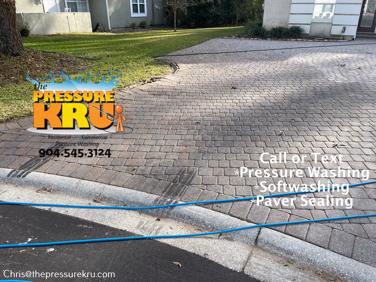 Removing dirt and stains from paver driveway before in Greenleaf Village.