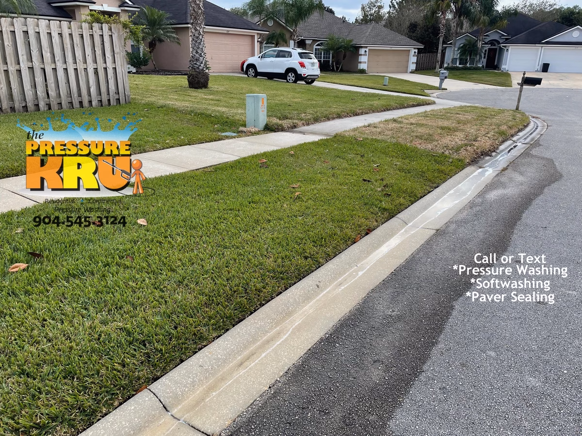 Dirty concrete curb cleaning in St. Augustine, FL 32092 after