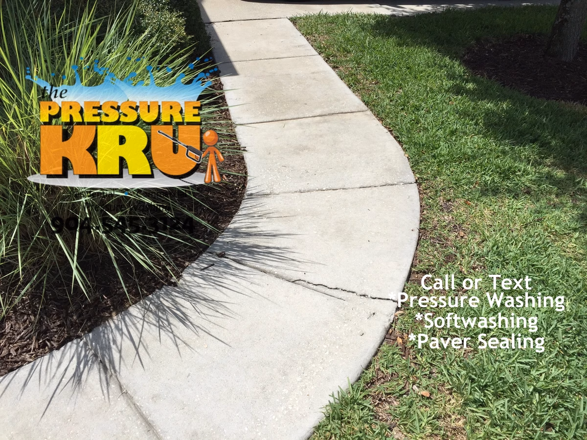 Concrete sidewalk cleaning in St Augustine FL after. This sidewalk could have been cleaned with chemical alone.