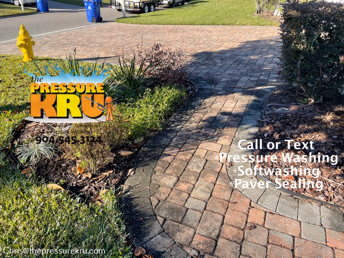 Paver driveway cleaning process step by step before in St. Johns Golf & Country Club.