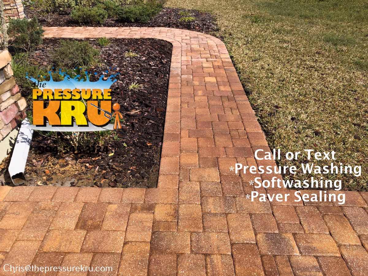 Professional pressure washing paver driveway after in Waterford Lakes.