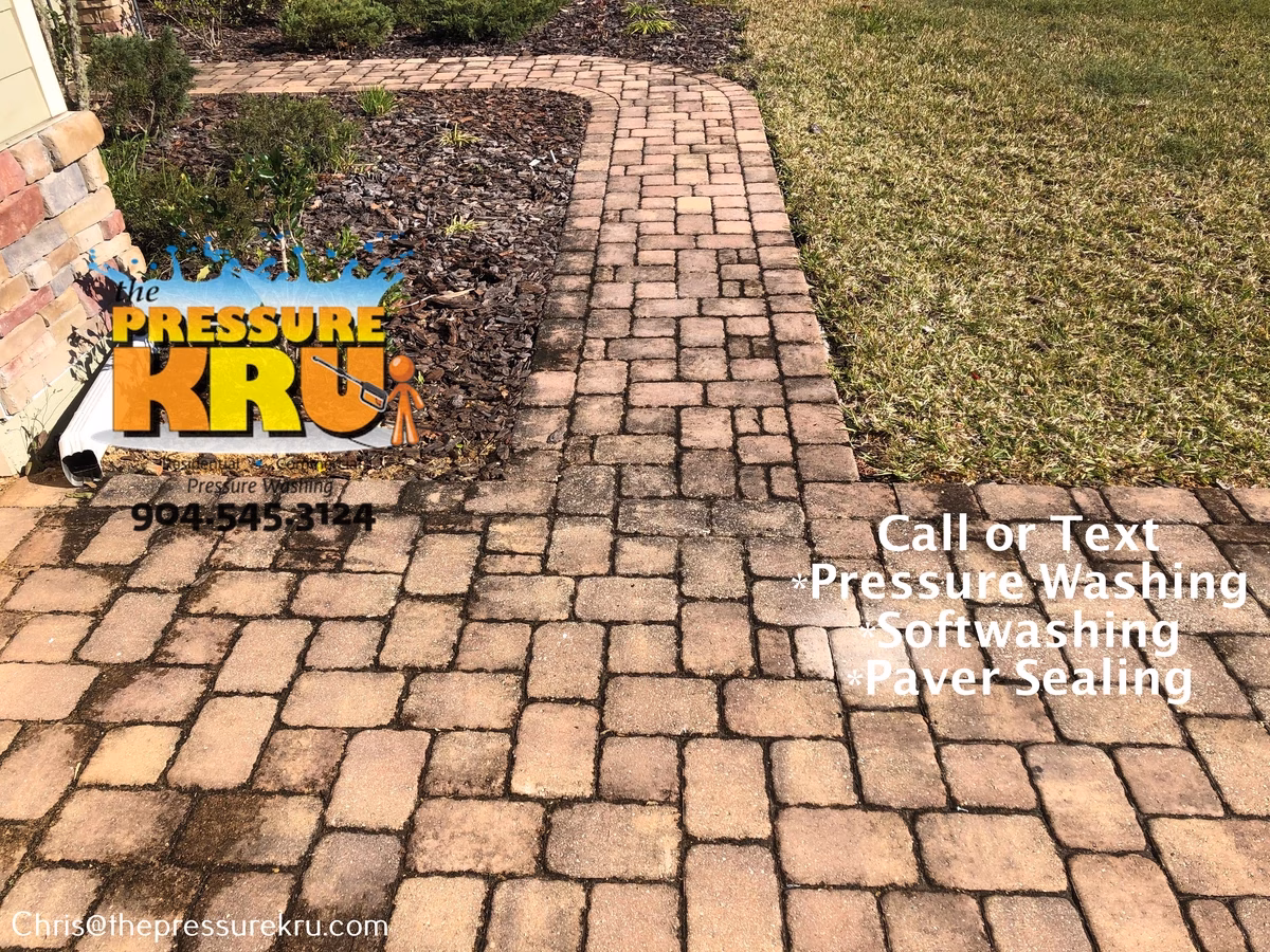 Professional pressure washing paver driveway before in Waterford Lakes.