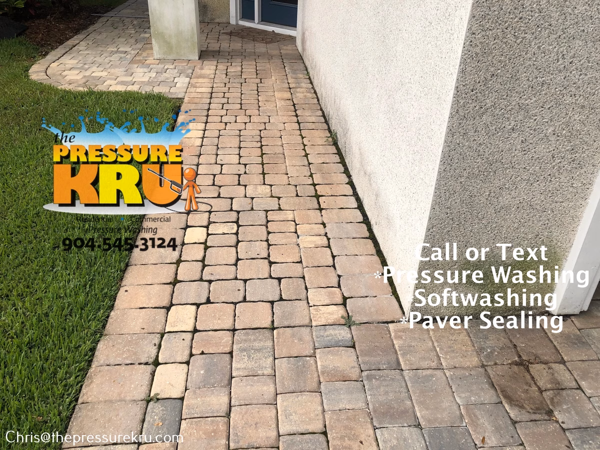 Beautiful clean paver driveway before pressure washing in Durbin Crossing.